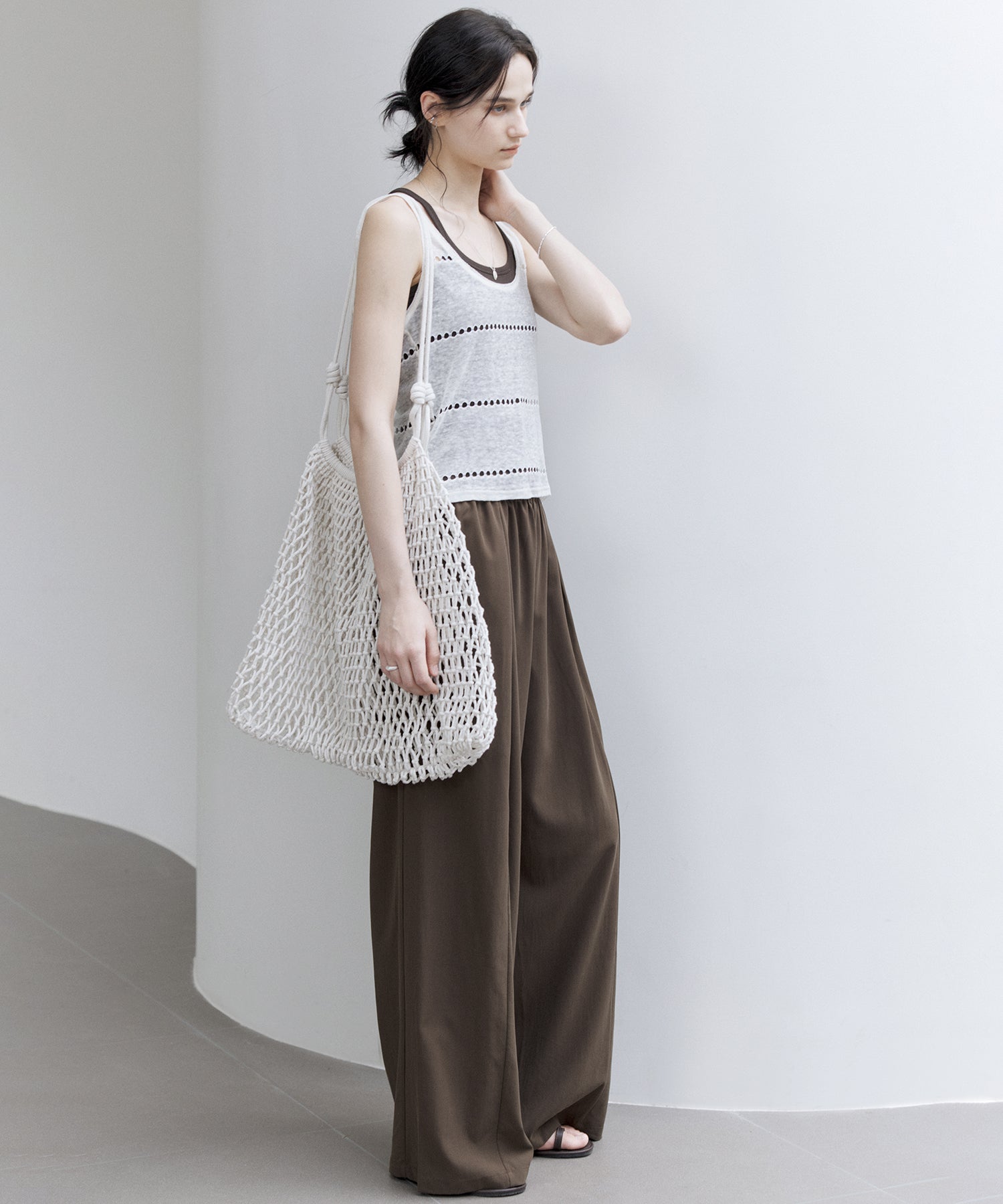 Sheer Knit Sleeveless Blouse – Stylish Summer Layer