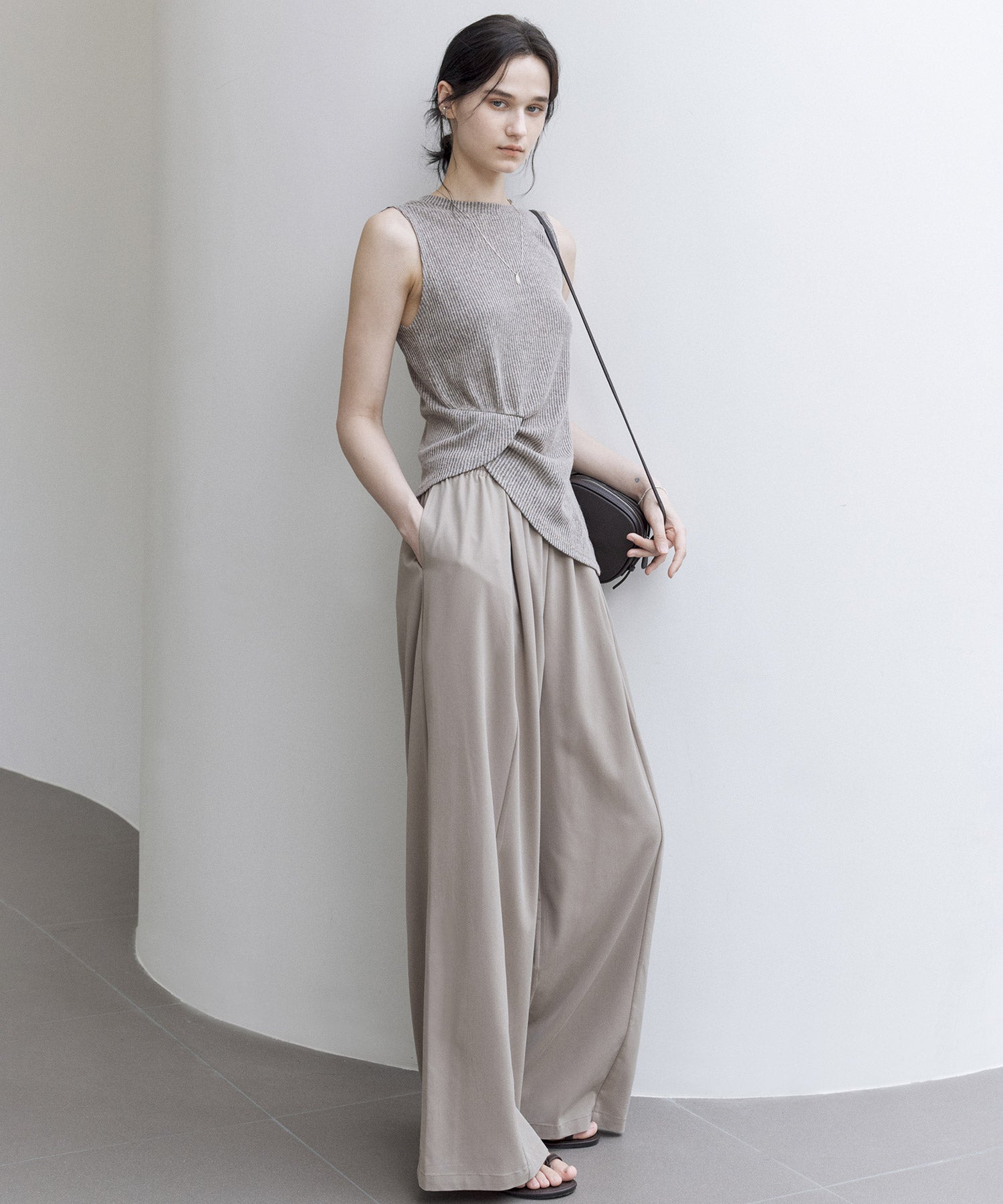 Linen Blend Sleeveless Knit Top with Deconstructed Tuck Design