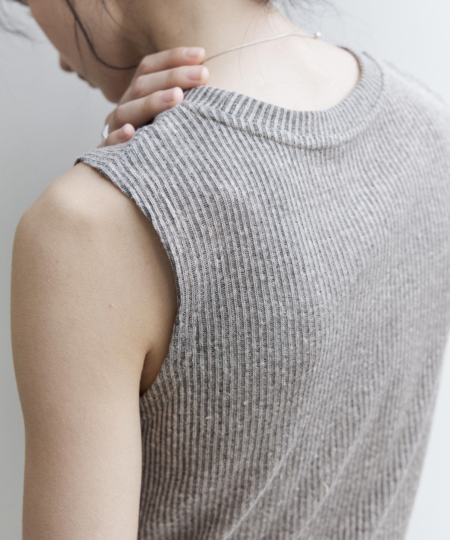 Linen Blend Sleeveless Knit Top with Deconstructed Tuck Design