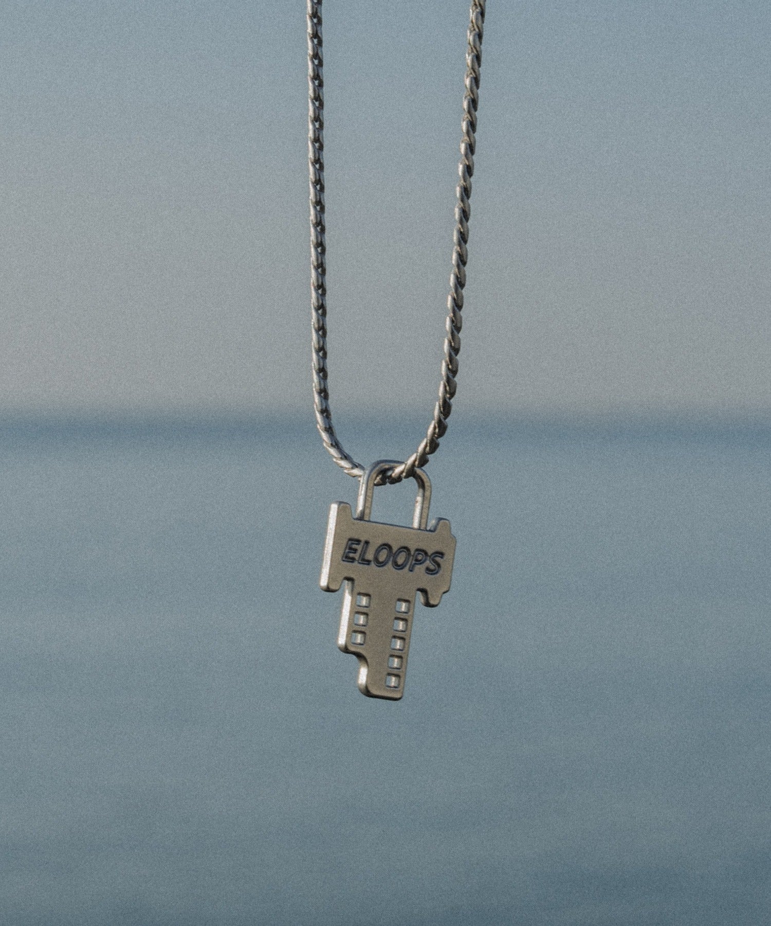 Key-Shaped Charm Necklace with Eloops Logo on Snake Chain