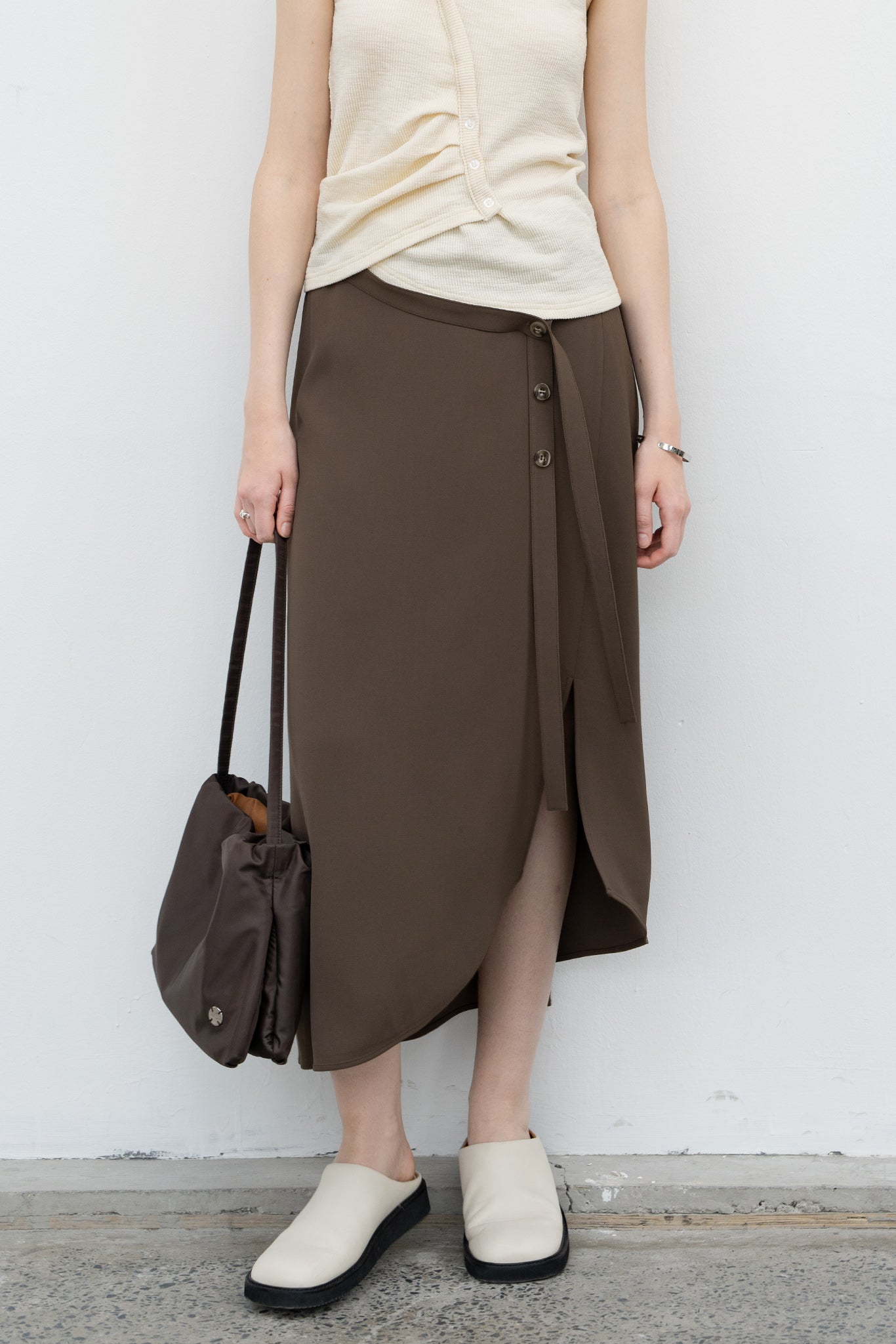 Asymmetric tight skirt with waist belt 