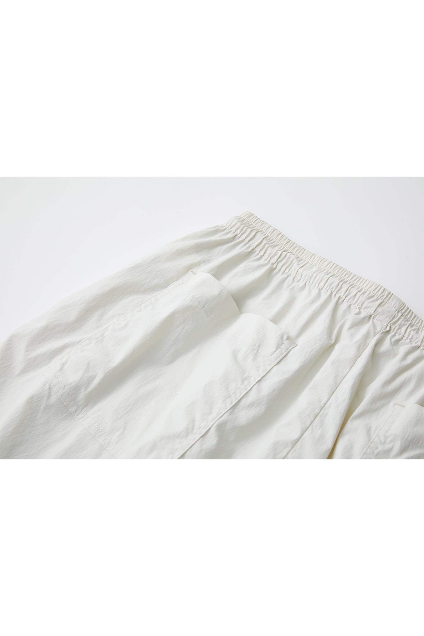 [tageechita] "T" embroidered Lina low straight pants