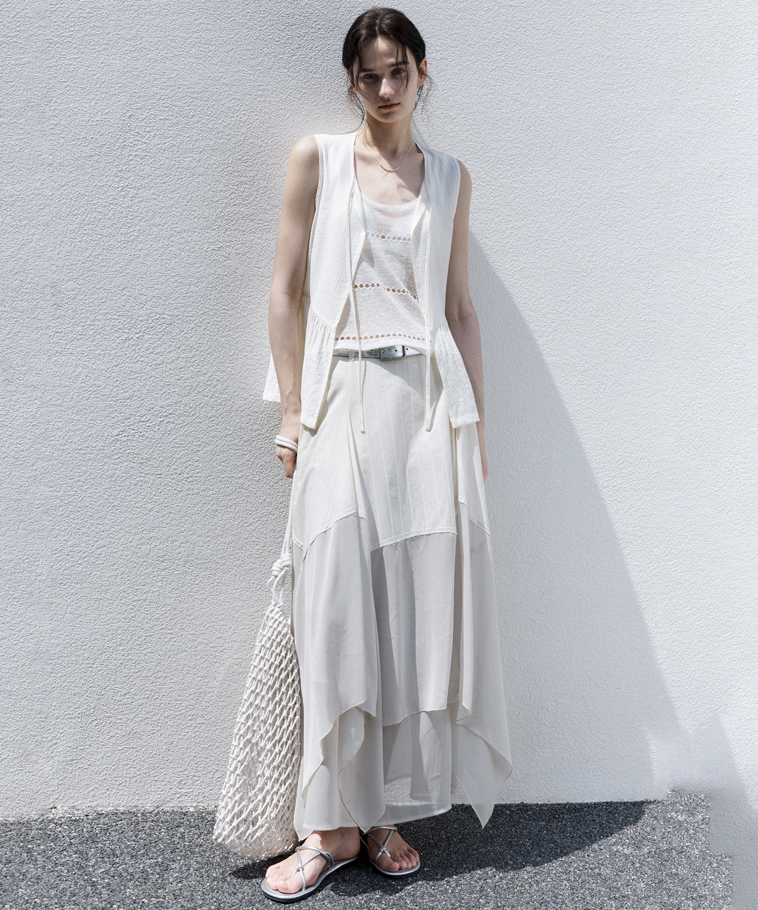 Sheer Knit Sleeveless Blouse – Stylish Summer Layer
