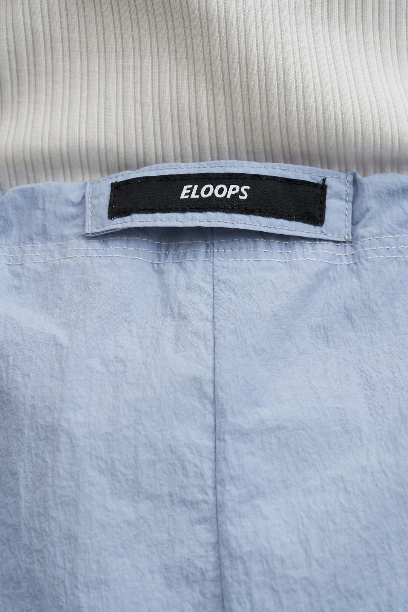 「ELOOPS」アジャスタブルナイロンワイドパンツ