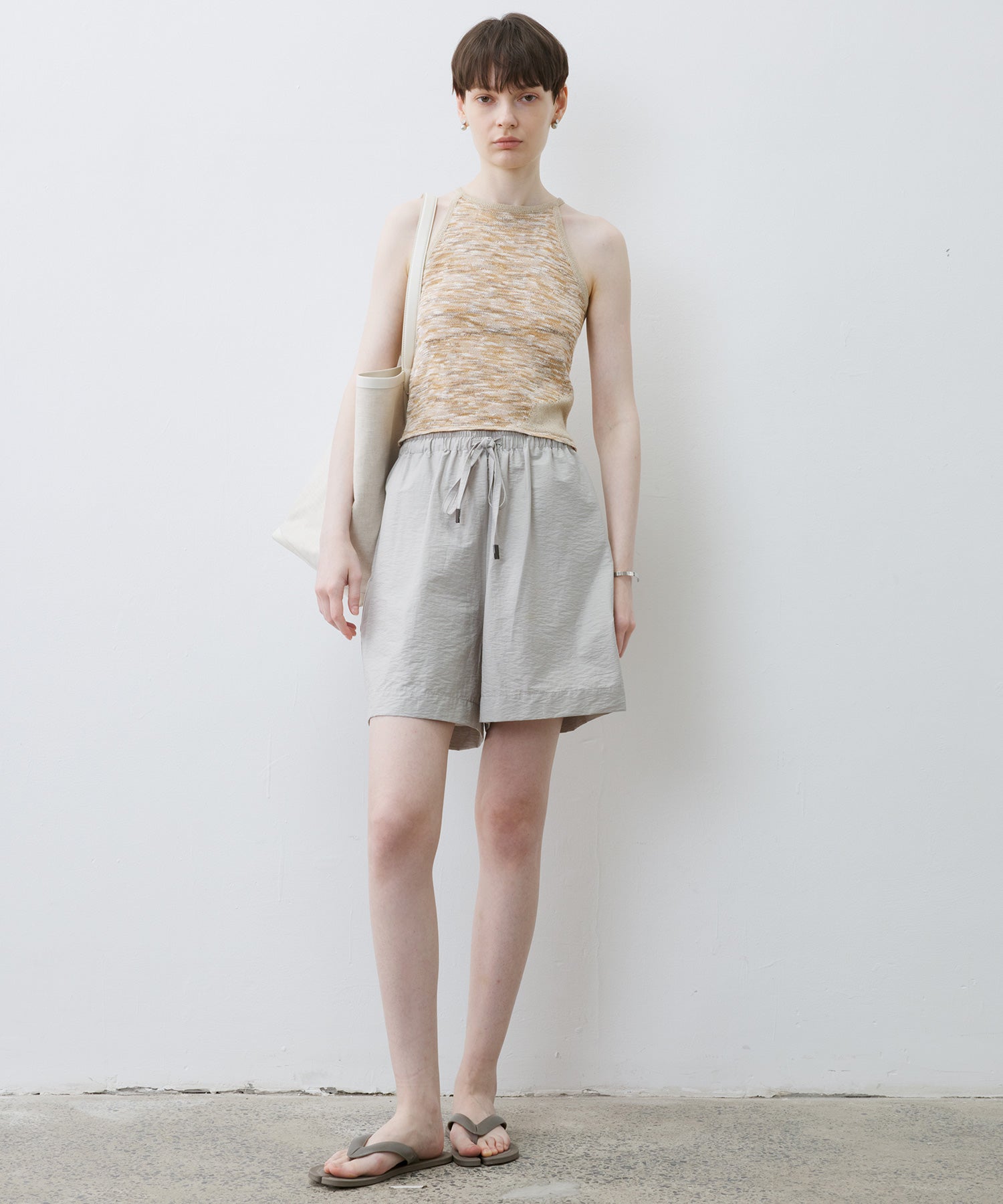 [tageechita] "T" embroidered Lina low straight pants