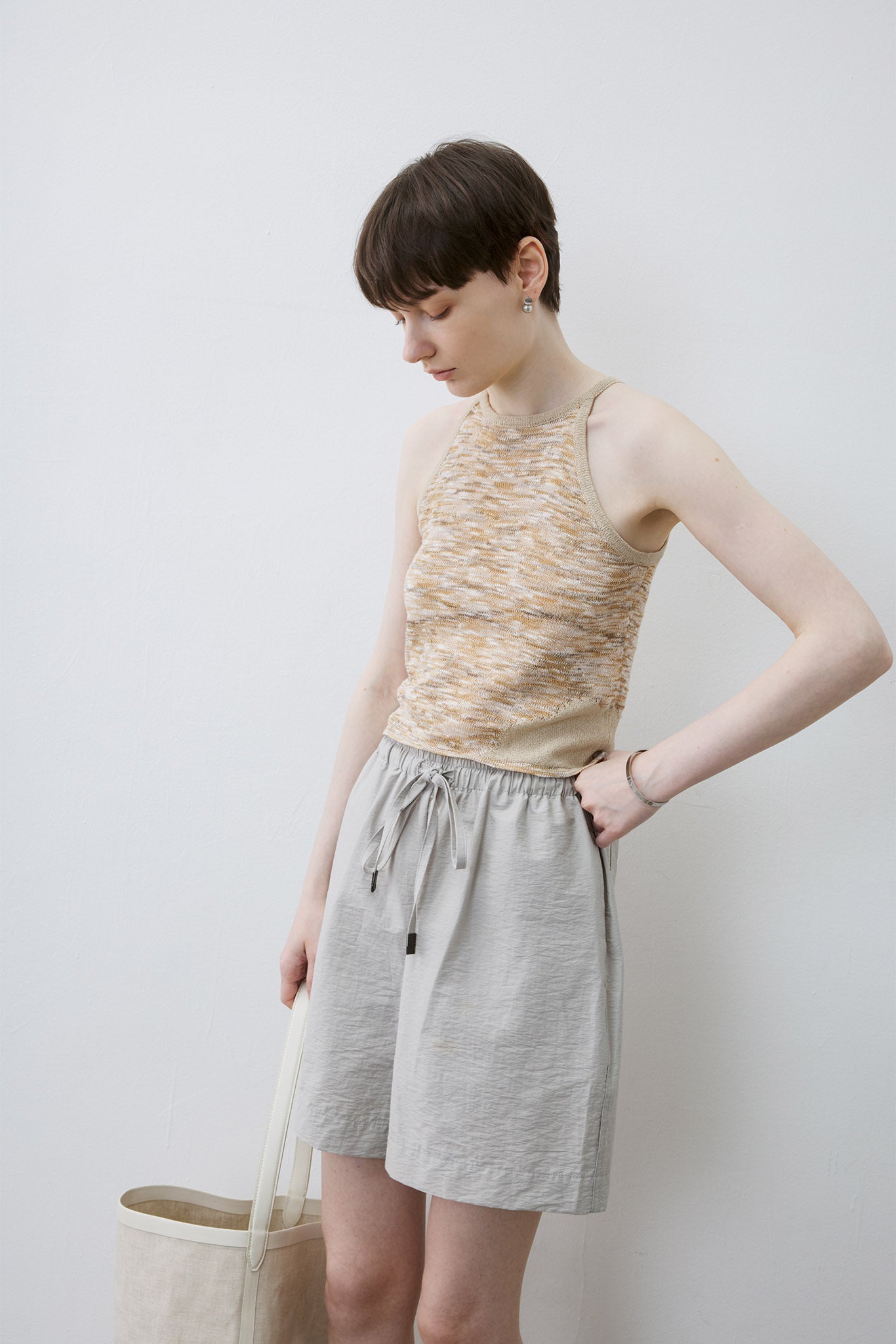 [tageechita] "T" embroidered Lina low straight pants