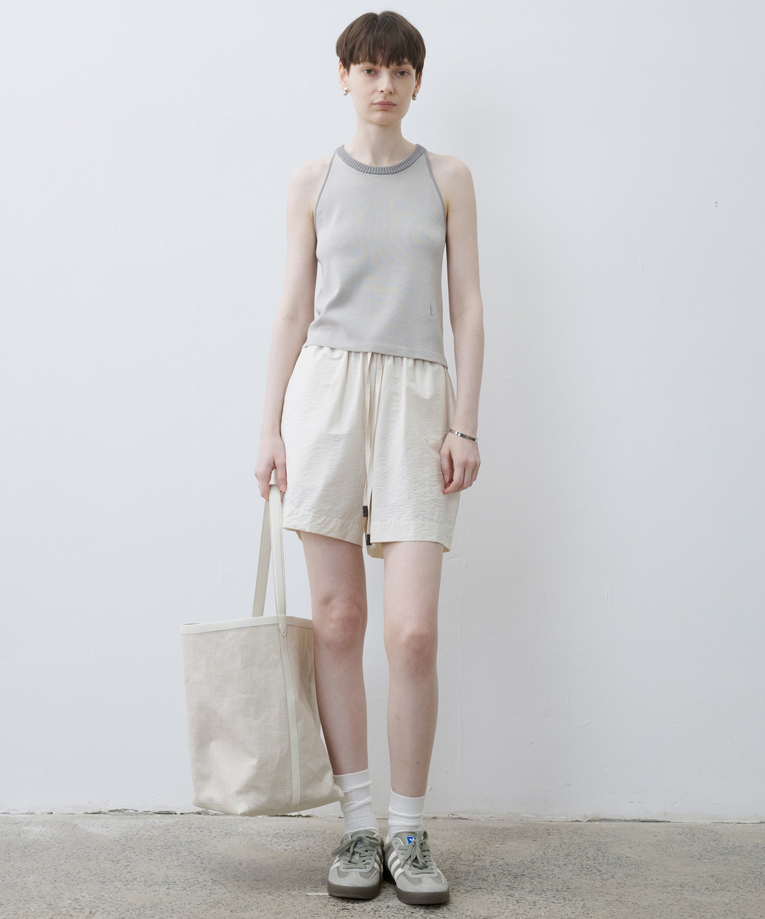 [tageechita] "T" embroidered Lina low straight pants