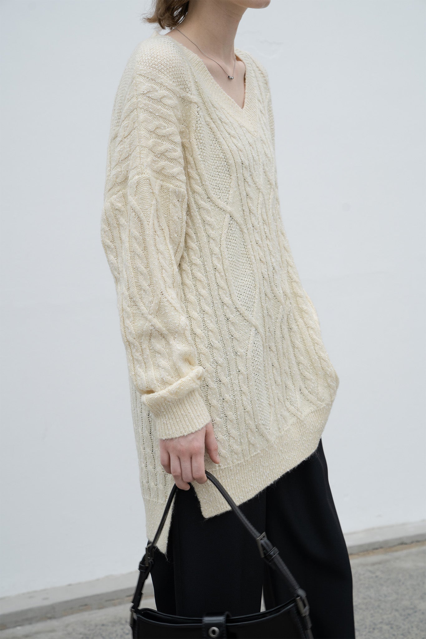 Cable-knit jacquard oversized V-neck knit top 