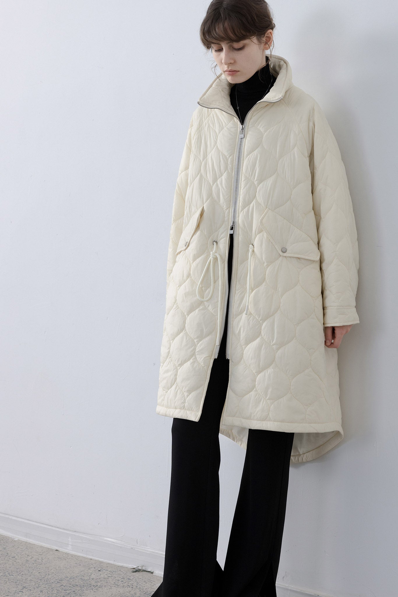 Irregular hem oversized volume quilted long coat 