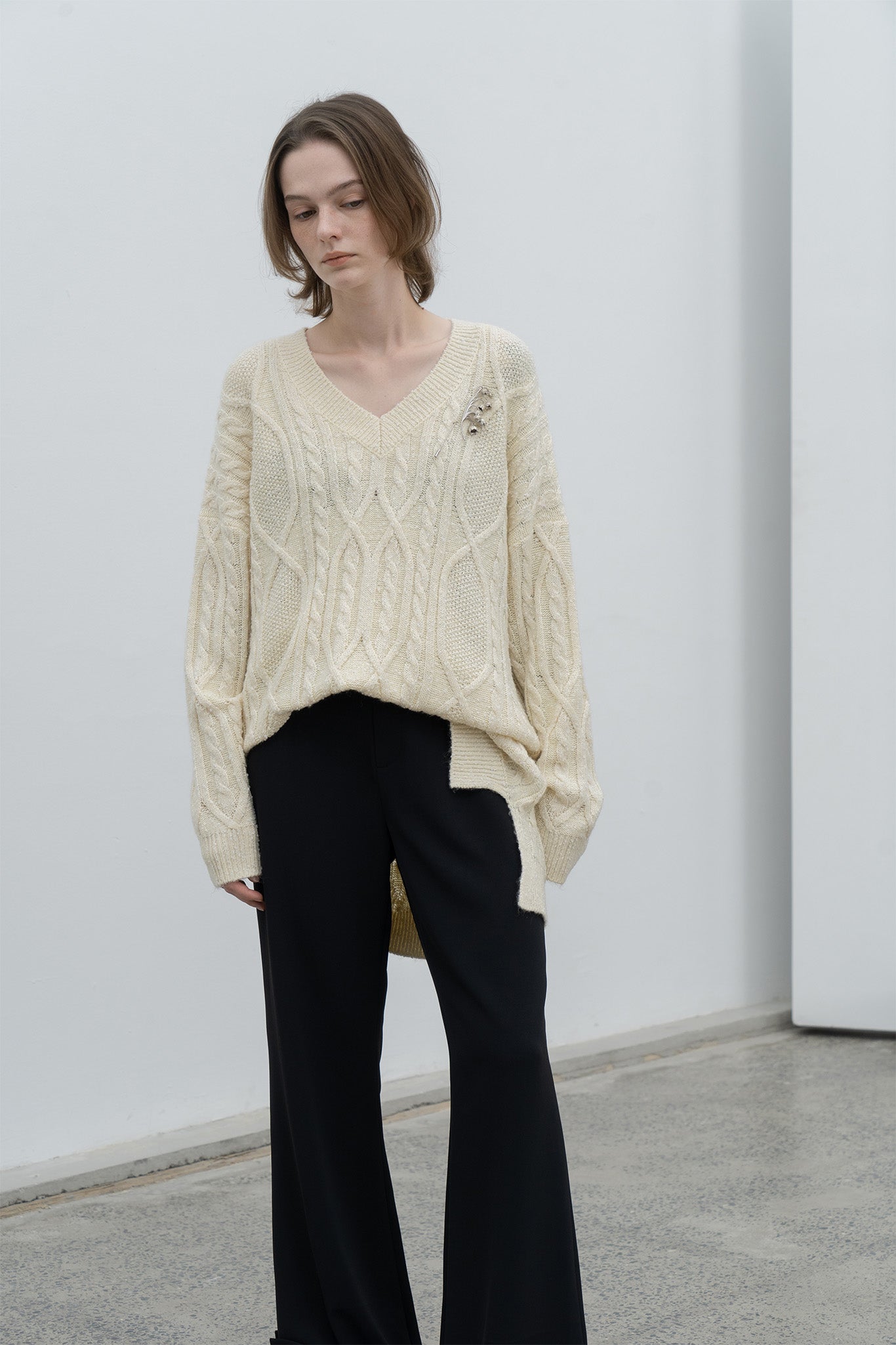 Cable-knit jacquard oversized V-neck knit top 