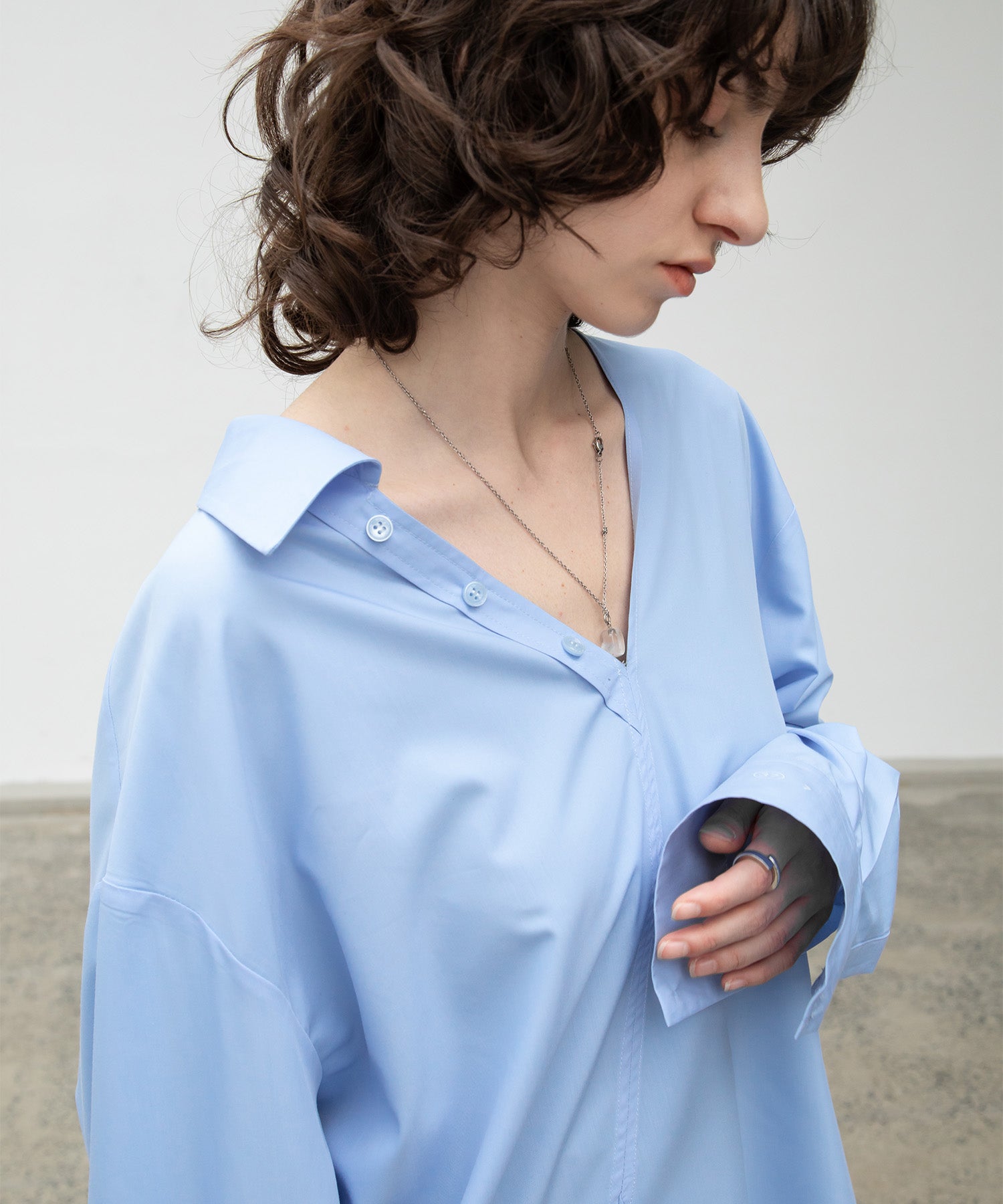 Asymmetric color pullover shirt 