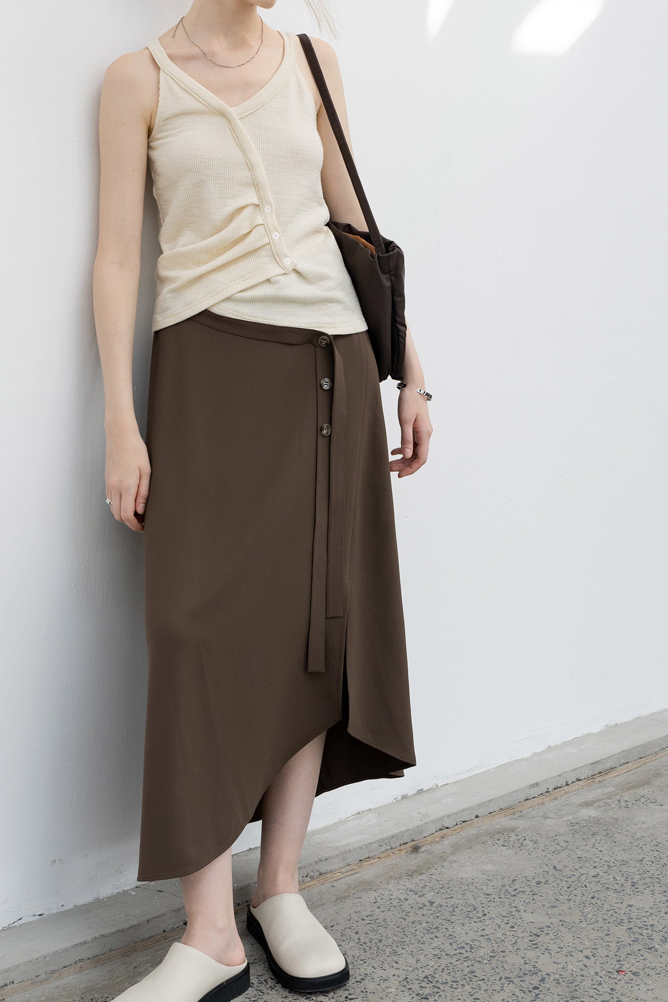 Asymmetric tight skirt with waist belt 