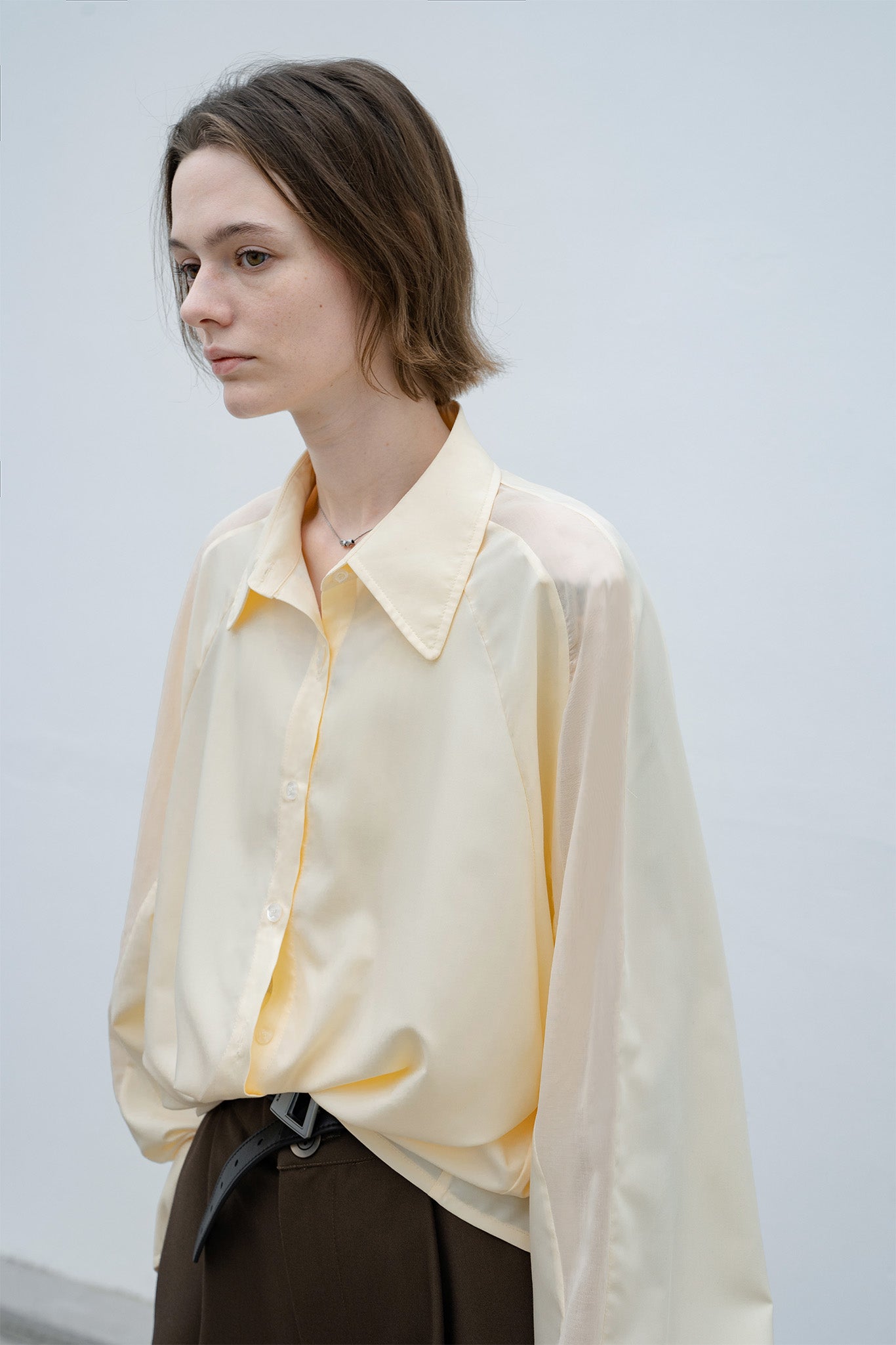 Sleeve line switching loose silhouette shirt 